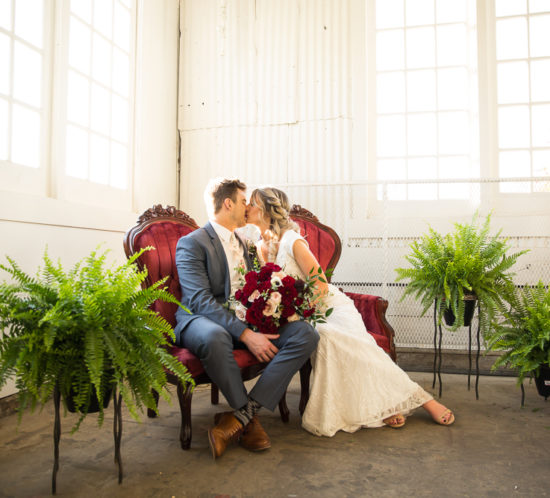 couple kissing in the White Shanty Provo