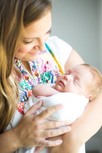 mom with newborn in home photography