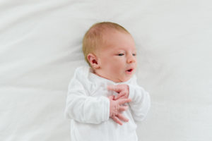 newborn baby boy on soft white background