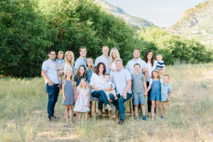 Extended family photo in a field