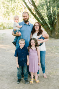 Family of four with small children