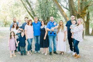Extended family photo with everyone looking