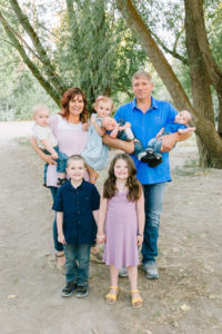 Grandparents holding grandkids