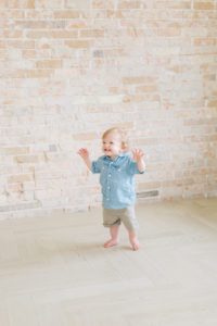 one year old learning to walk