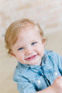 one year old smiling